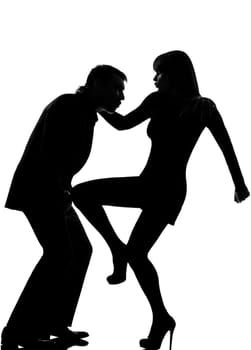 one caucasian couple man and woman self defense  domestic violence in studio silhouette isolated on white background
