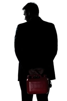 one caucasian man out of gas holding can portrait silhouette in studio isolated white background