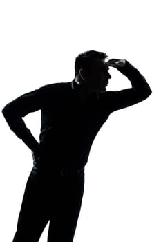 one caucasian man portrait  looking forward gesture silhouette in studio isolated on white background