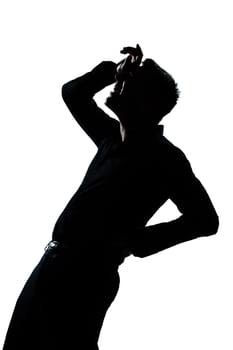 one caucasian man portrait silhouette pain backache in studio isolated white background
