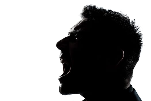 one caucasian man portrait silhouette profile screaming angry in studio isolated white background