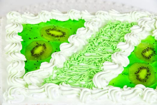 fruit kiwi cake closeup isolated on a white