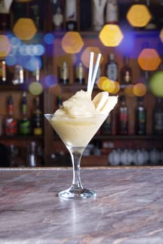 banana frozen cocktail on the wooden bar