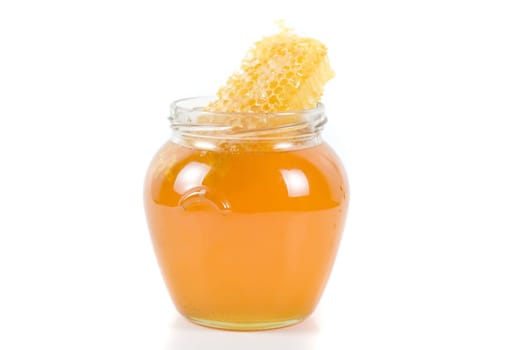 jar of organic honey on white background
