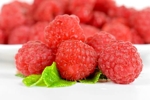fresh raspberry closeup on a white background