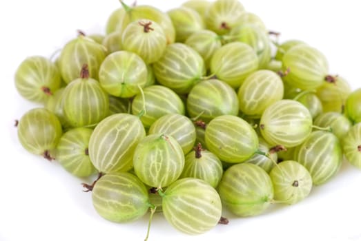 green ripe gooseberries isolated on a white background