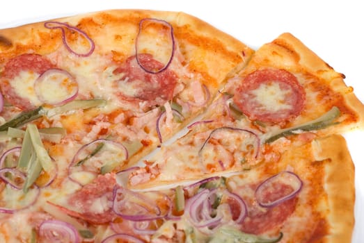 pizza closeup with smoked meat, salami, gherkin, onion and mozzarella cheese