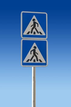 Two pedestrian Sign on a blue background
