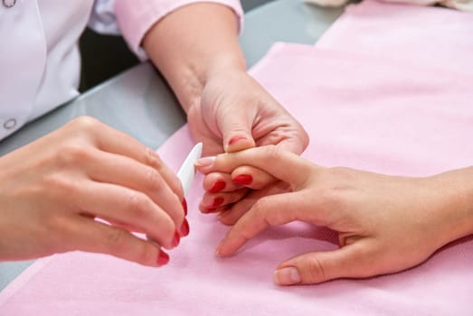 Female hands closeup at manicure process