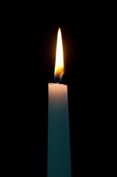 White candle with a bright flame