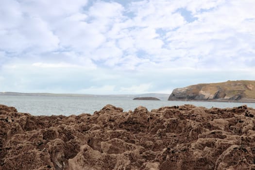 a scenic view of beautiful rocky ballybunion beach in kerry ireland