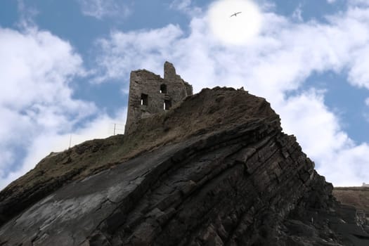 ballybunion castle on the rocks in the west coast of ireland