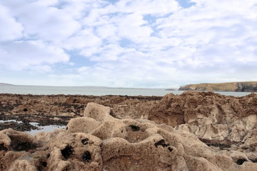 a scenic view of beautiful rocky ballybunion beach in kerry ireland