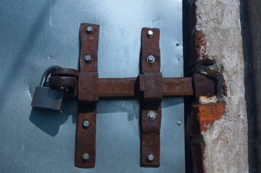 Lock on a door with bolt on it