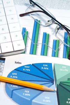 A business strategy using color charts and a calculator
