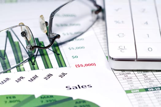 A business strategy using color charts and a calculator
