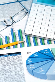 A business strategy using color charts and a calculator
