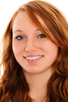 Portrait of a young redhead woman on a white background