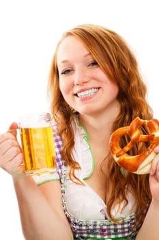 Young happy woman in dirndl with beer and pretzel on white background