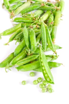 Ripe pea vegetable with green leaf isolated on white background
