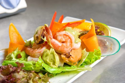 appetizer closeup dish of seafood and vegetables