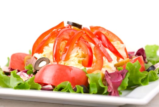 spicy salad of roast beef with potato, tomato, cabbage, pepper and lettuce