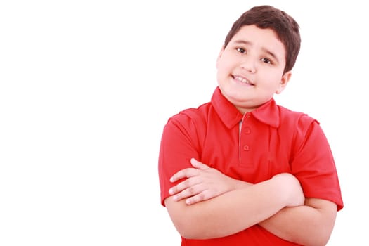 Happy little boy looking at camera