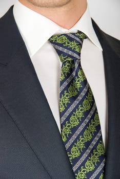 closeup of businessman suit with tie