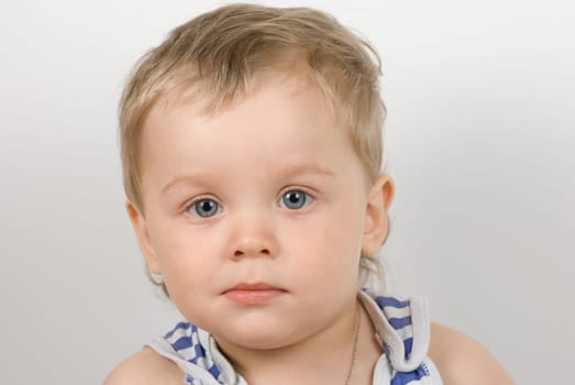 cute one year old boy studio portrait