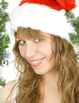 Happy pretty santa woman on firtree background