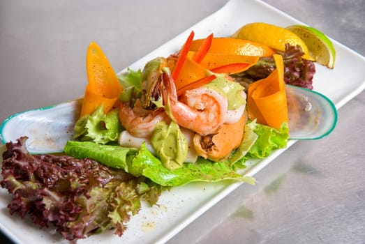 appetizer closeup dish of seafood and vegetables
