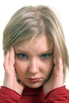 Portrait of a young adult woman suffering from headache  isolated on white.