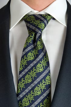 closeup of businessman suit with tie