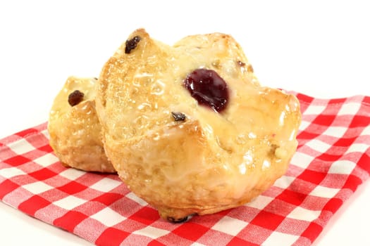 Two Reformation buns against white background