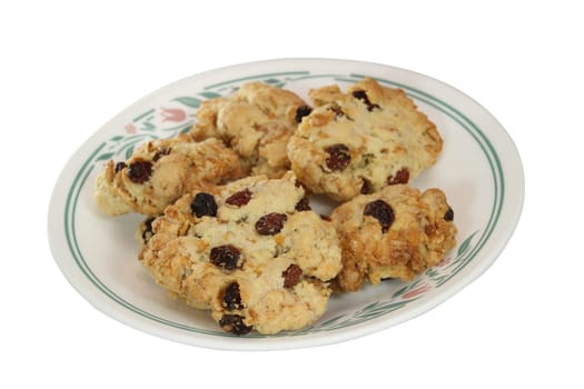 A plate of home made cookies on a white background