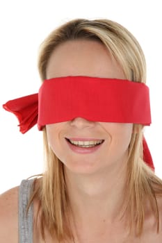 Pretty young blonde lady with a red blindfold over her eyes