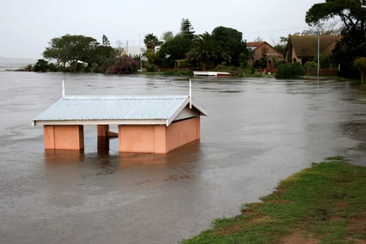 Flooded jetty room with water half way up it&#039 s walls
