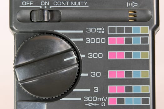 The top dial of a digital multimeter