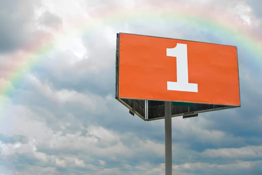 Huge orange billboard with number one. Stormy clouscape and rainbow at the background