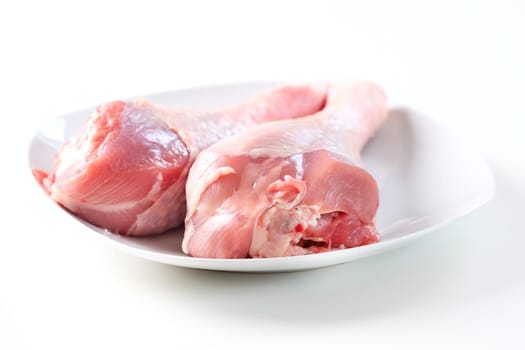 Raw turkey hen meat on the plate