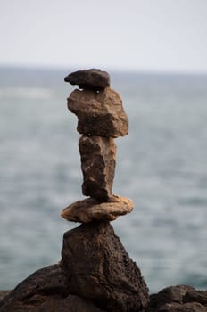 A pile of small random rocks left on the beach on Lanzarote, Canary Islands, Spain