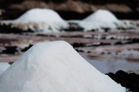 Salt piles on a saline exploration in Janubio on Lanzarote Island, Spain