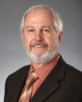 Studio portrait of distinguished looking mature Caucasian man.