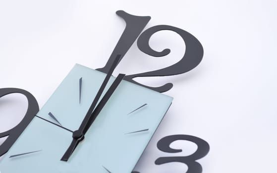 Close up of a fancy looking clock on a white background