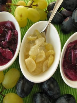 Small bowls of grape jam