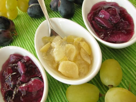 Small bowls of grape jam