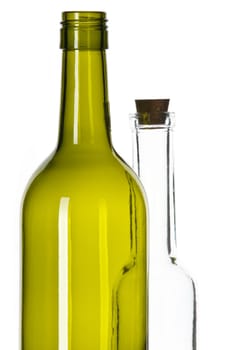 Empty glass bottles with corks isolated on white background