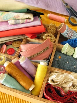 Sewing box with colorful sewing utensils