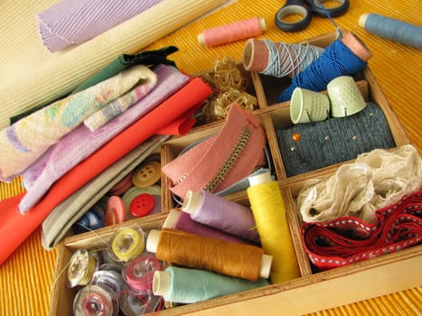 Sewing box with colorful sewing utensils