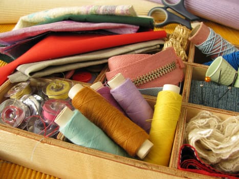 Sewing box with colorful sewing utensils